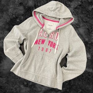 AeroPostale Y2K Women's Gray Zip-Up Hoodie with Pink Lettering